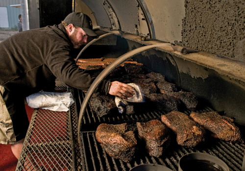 An Insider's Look at Pitmaster John's BBQ: The Ultimate American Rib Festival Experience